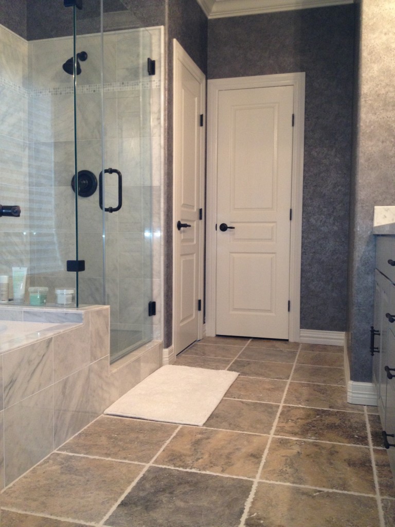 Marble and Travertine Master Bathroom Remodel in Austin TX by Vintage Modern Design & Build Contractor