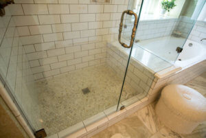 Victorian Bathroom Remodel in Austin Subway Tile Calcatta Gold Marble by Vintage Modern Design Build