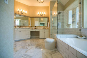 Victorian Bathroom Remodel in Austin Subway Tile Calcatta Gold Marble by Vintage Modern Design Build