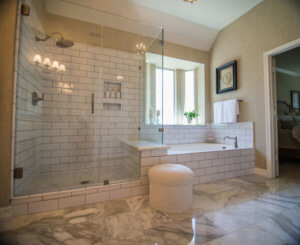 Victorian Bathroom Remodel in Austin Subway Tile Calcatta Gold Marble by Vintage Modern Design Build