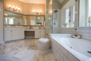 Victorian Bathroom Remodel in Austin Subway Tile Calcatta Gold Marble by Vintage Modern Design Build