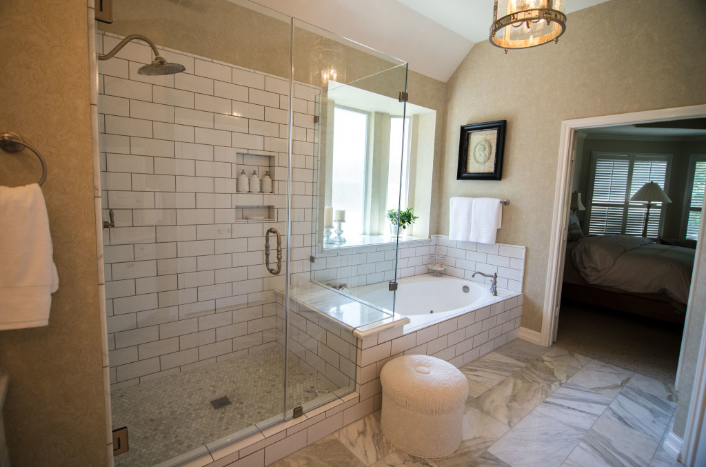 Victorian Bathroom Remodel in Austin Subway Tile Calcatta Gold Marble by Vintage Modern Design Build
