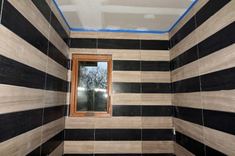 Limestone Bathroom Remodel in Austin Tx by Vintage Modern Design Build