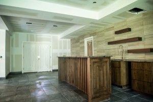 Custom Walnut Bar w mid century modern theme by Vintage Modern Design Build Austin Tx