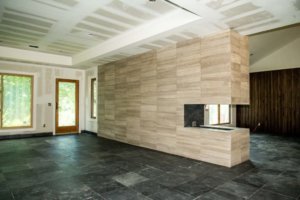 Custom Minimalist Modern Peninsula style Fireplace by Vintage Modern Design Build Austin Tx