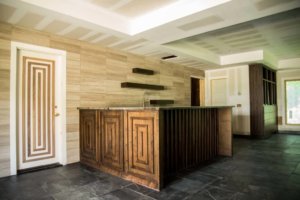 Custom Walnut Bar w mid century modern theme by Vintage Modern Design Build Austin Tx