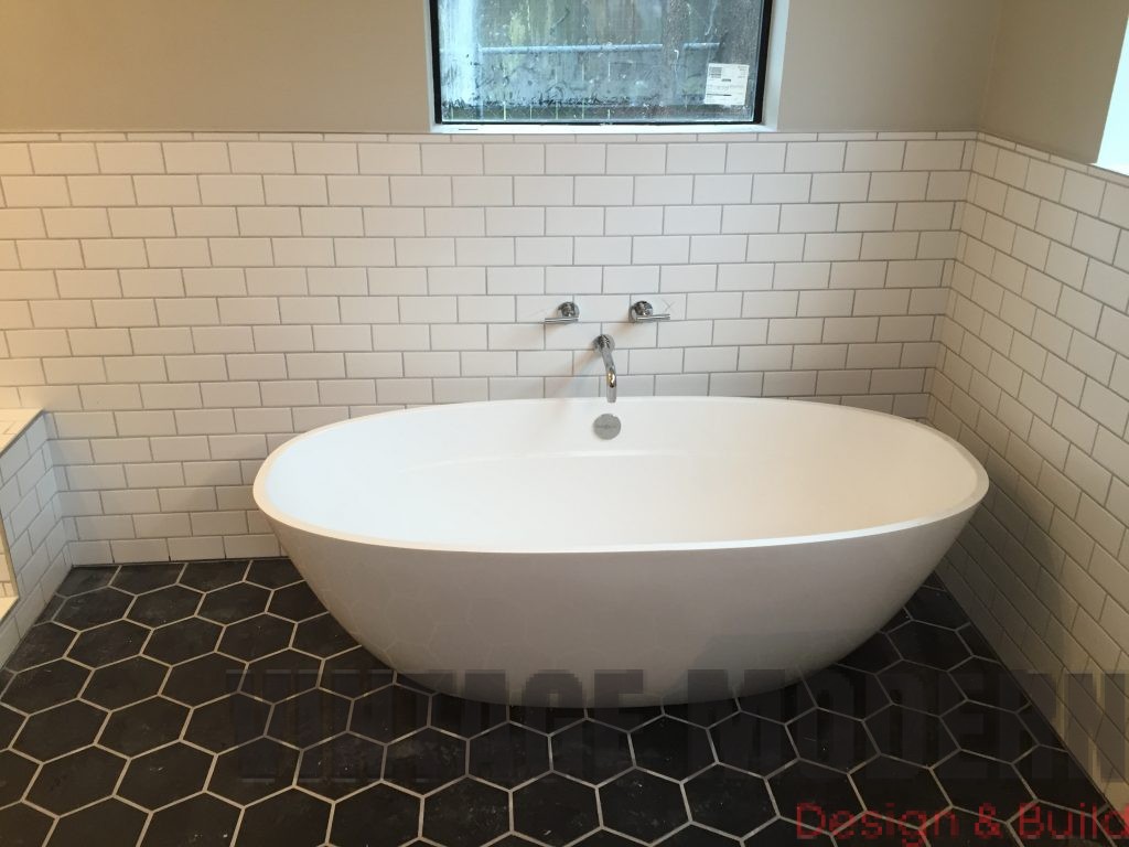 This bathroom remodeling project in austin tx was done by vintage modern design build