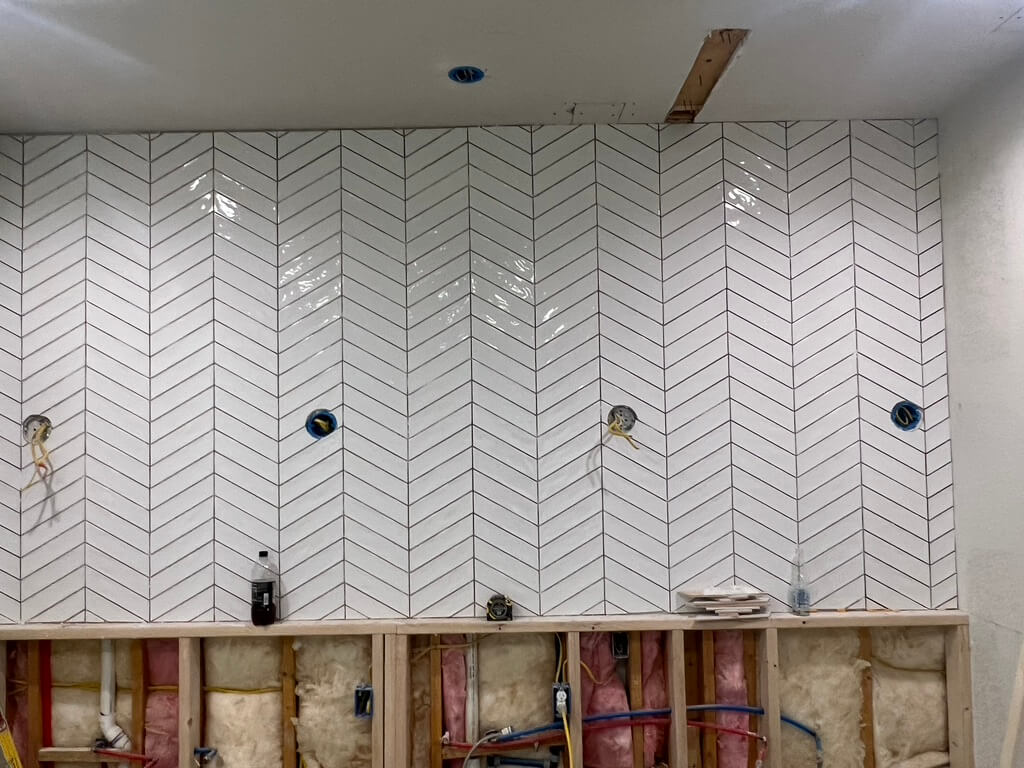 Calacatta Gold Walk in Shower Remodeling Project in Austin TX by Vintage Modern Design Build - Kitchen & Bathroom Remodeling in Austin TX