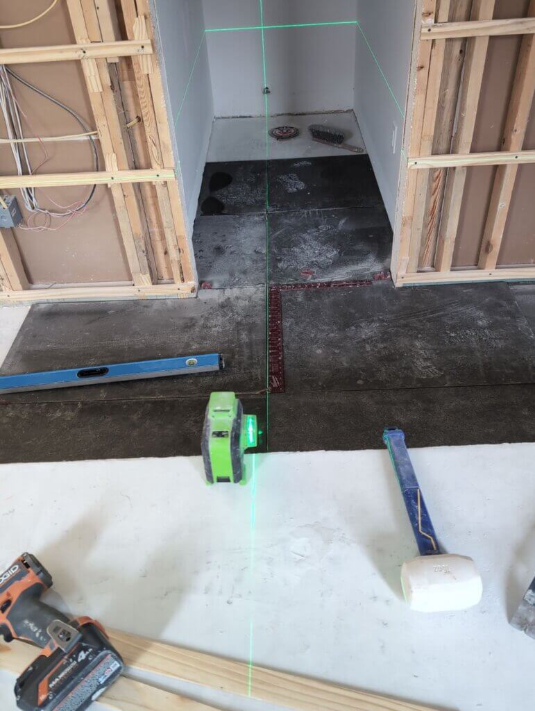 Large format basalt floor installation Austin TX